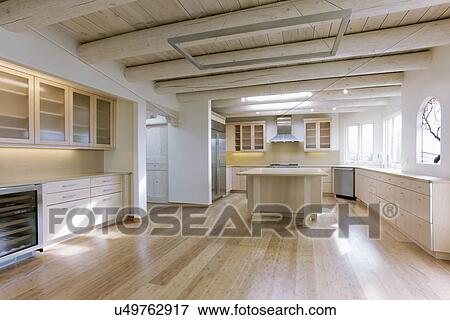 Empty kitchen and bar in contemporary home, Santa Fe, New Mexico, USA View Large Photo Image Stock Photo - Empty kitchen and bar in contemporary home, Santa Fe, New Mexico, USA. Fotosearch