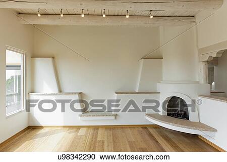 Stock Image - Empty living room in contemporary southwestern style home, Santa Fe, New Mexico, USA. Fotosearch