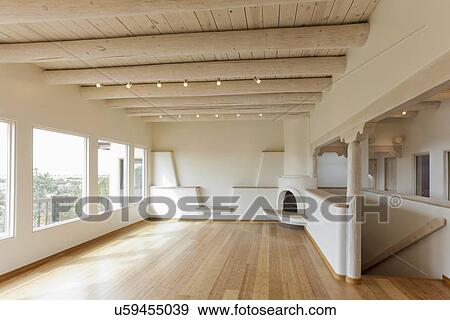 Empty living room in contemporary southwestern style home, Santa Fe, New Mexico, USA View Large Photo Image Stock Photo - Empty living room in contemporary southwestern style home, Santa Fe, New Mexico, USA. Fotosearch