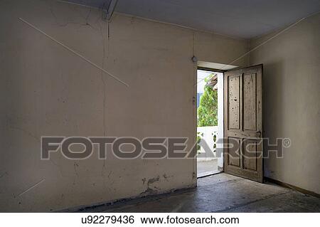 Empty room in abandoned house View Large Photo Image Stock Photograph - Empty room in abandoned house. Fotosearch
