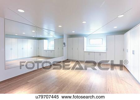Empty room in contemporary home with mirrored wall, Santa Fe, New Mexico, USA View Large Photo Image Stock Photography - Empty room in contemporary home with mirrored wall, Santa Fe, New Mexico, USA. Fotosearch