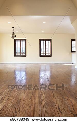 Stock Photo - Empty room with hardwood flooring, Pasadena, California, USA. Fotosearch