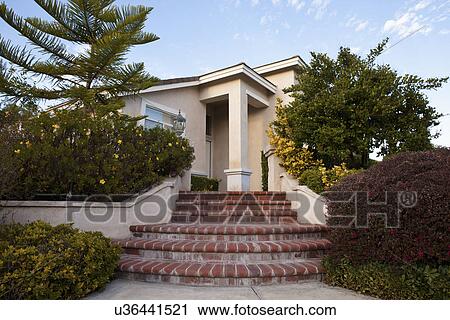 Stock Image - Entrance of traditional home, Laguna Beach, California, USA. Fotosearch