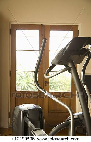 Stock Photograph - Exercise equipment in home; Carpinteria; California; USA. Fotosearch