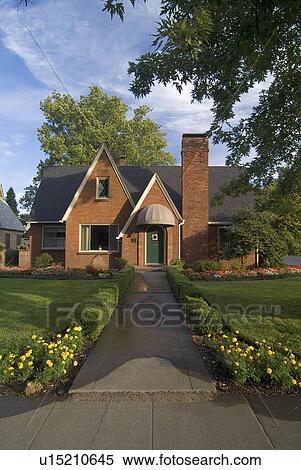 Exterior front view of red brick cottage with landscaping at Chico; California; USA View Large Photo Image Stock Photography - Exterior front view of red brick cottage with landscaping at Chico; California; USA. Fotosearch