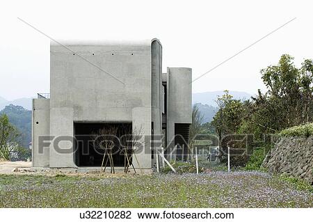 Stock Image - Exterior modern home under construction. Fotosearch