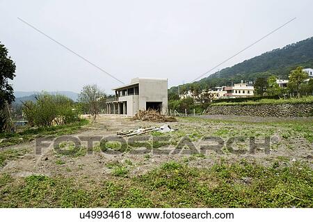 Exterior modern home under construction View Large Photo Image Stock Photo - Exterior modern home under construction. Fotosearch