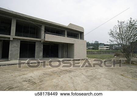 Exterior modern home under construction View Large Photo Image Stock Photo - Exterior modern home under construction. Fotosearch
