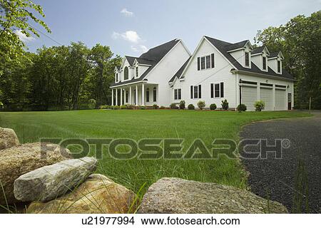 Picture - Exterior of a single family home. Fotosearch