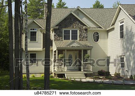Stock Image - Exterior of a single family home. Fotosearch