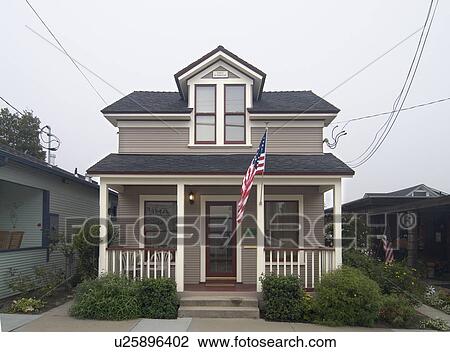 Stock Image - Exterior view two story American Craftsman styled bungalow at Pacific Grove; California; USA. Fotosearch