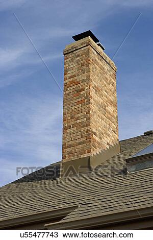 EXTERIORS: Close up architectural detail of outdoor chimney, brick chimney View Large Photo Image Stock Image - EXTERIORS: Close up architectural detail of outdoor chimney, brick chimney. Fotosearch