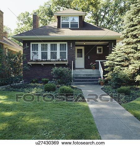 EXTERIORS: Two-story single family house, brick city bungalow, covered porch, concrete walk and front steps, window boxes View Large Photo Image Stock Photo - EXTERIORS: Two-story single family house, brick city bungalow, covered porch, concrete walk and front steps, window boxes. Fotosearch