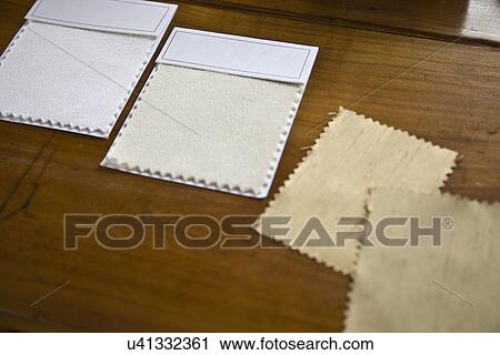 Fabric swatches laid on wooden coffee table; Carpinteria; California; USA View Large Photo Image Stock Image - Fabric swatches laid on wooden coffee table; Carpinteria; California; USA. Fotosearch