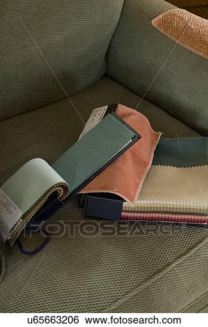 Fabric swatches on green armchair; Carpinteria; California; USA View Large Photo Image Stock Photograph - Fabric swatches on green armchair; Carpinteria; California; USA. Fotosearch
