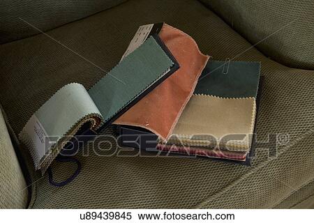 Fabric swatches on green armchair; Carpinteria; California; USA View Large Photo Image Stock Photography - Fabric swatches on green armchair; Carpinteria; California; USA. Fotosearch
