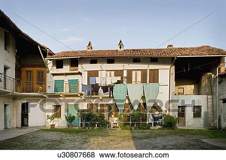 Stock Photo - Facade of an old residential building in Albiano d'Ivrea, Italy. Fotosearch
