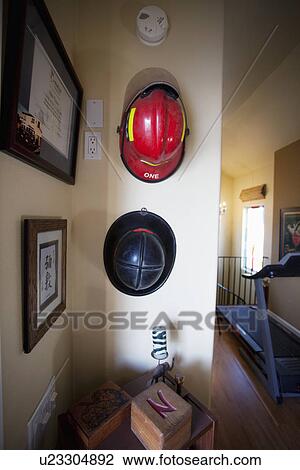 Firefighter helmets hanging on wall; Seal Beach; California; USA View Large Photo Image Stock Image - Firefighter helmets hanging on wall; Seal Beach; California; USA. Fotosearch