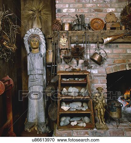 Fireplace area with artifacts and old copper pots View Large Photo Image Stock Image - Fireplace area with artifacts and old copper pots. Fotosearch