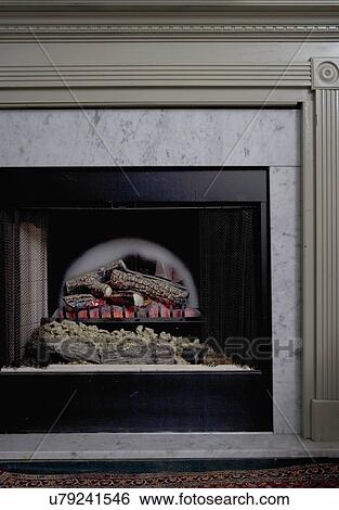 FIREPLACES; Dimplex electric insert in corner close up View Large Photo Image Stock Photograph - FIREPLACES; Dimplex electric insert in corner close up. Fotosearch