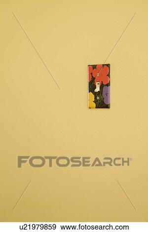Stock Photo - Flower painted decorative light switch. Fotosearch
