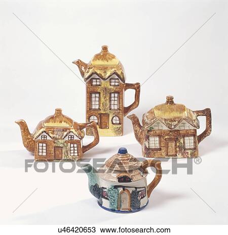 Stock Image - Four abstract teapots over white background. Fotosearch