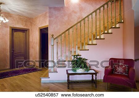 Stock Photo - Front door and staircase in Italian home; Italy. Fotosearch