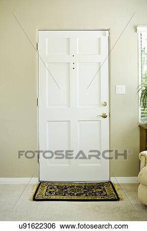 Stock Photograph - Front door with peep holes, San Diego, California, United States of America. Fotosearch