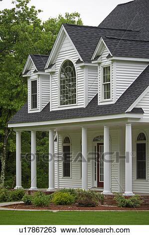 Stock Image - Front entrance of single family home. Fotosearch