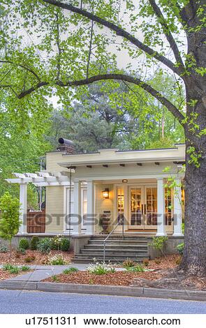 Stock Image - Front exterior California Bungalow and landscaping; Chico; California; USA. Fotosearch