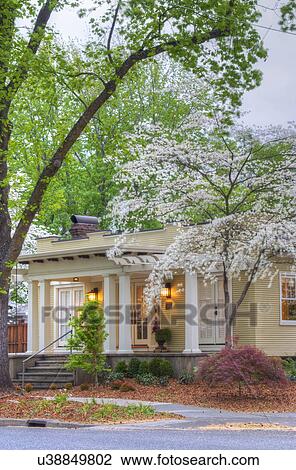 Stock Image - Front exterior California Bungalow and landscaping; Chico; California; USA. Fotosearch