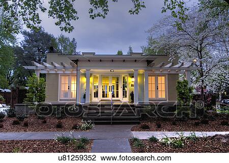 Stock Image - Front exterior California Bungalow and landscaping; Chico; California; USA. Fotosearch