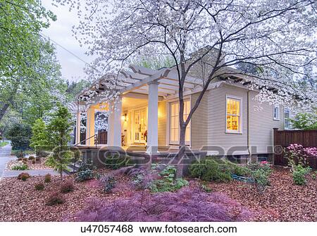 Stock Photo - Front exterior California Bungalow and landscaping; Chico; California; USA. Fotosearch