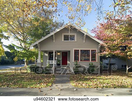 Front Exterior Gray Bungalow With Red Door Chico California Usa