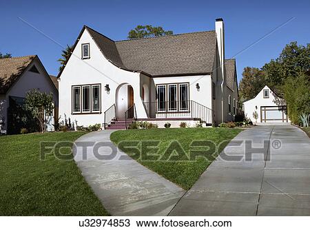 Stock Image - Front exterior of cottage, Pasadena, California, USA. Fotosearch