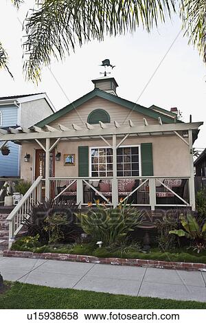 Front exterior of middle class beach house, Laguna Beach, California, USA View Large Photo Image Stock Photo - Front exterior of middle class beach house, Laguna Beach, California, USA. Fotosearch