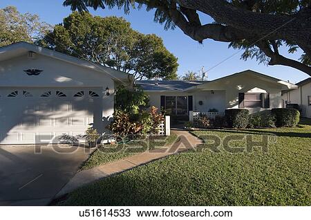 Front exterior single level home with garage View Large Photo Image Stock Image - Front exterior single level home with garage. Fotosearch