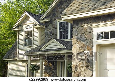 Front exterior traditional American home View Large Photo Image Stock Photo - Front exterior traditional American home. Fotosearch
