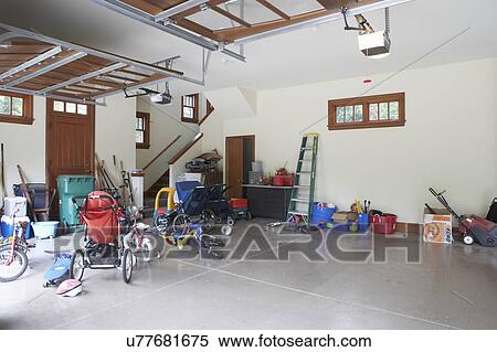 Garage Messy Garage Filled With Toys And Sporting Equipment