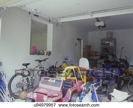 Picture Of Garage Storage Cluttered Mess Before Organization Kids Garage Storage Cluttered Mess Before Organization Kids Toys Bikes Horizontal