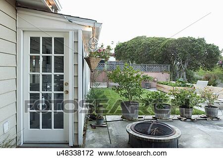 Garden in backyard of house View Large Photo Image Stock Image - Garden in backyard of house. Fotosearch
