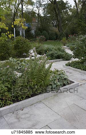 GARDENS: limestone walkway and edging, perennials, View Large Photo Image Stock Photography - GARDENS: limestone walkway and edging, perennials,. Fotosearch