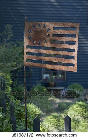 GARDENS: Rusty metal American flag, detail of garden ornament View Large Photo Image Stock Image - GARDENS: Rusty metal American flag, detail of garden ornament. Fotosearch