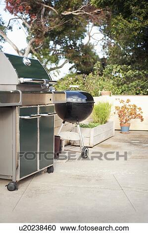 Gas and barbecue grill in yard at San Diego, California, United States of America View Large Photo Image Stock Image - Gas and barbecue grill in yard at San Diego, California, United States of America. Fotosearch