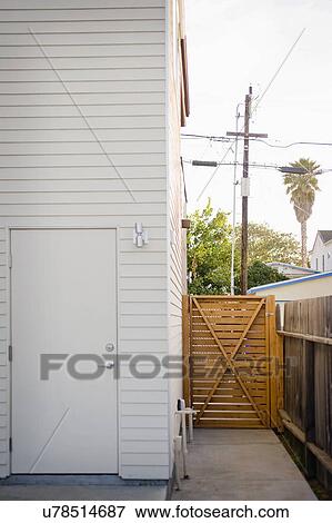 Gate alongside modern home, San Diego, California, USA View Large Photo Image Stock Photo - Gate alongside modern home, San Diego, California, USA. Fotosearch