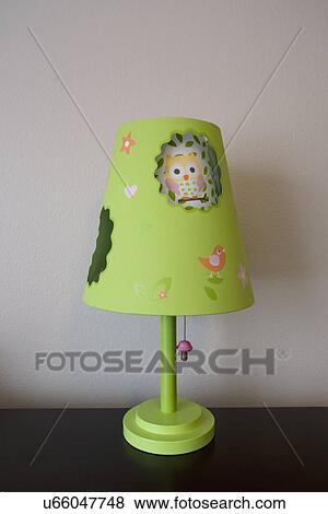Green lamp on dresser; Trabuco Canyon; California; USA View Large Photo Image Stock Photo - Green lamp on dresser; Trabuco Canyon; California; USA. Fotosearch