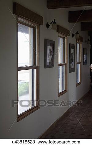 Stock Image - Hallway with multiple windows; Porterville; California; USA. Fotosearch