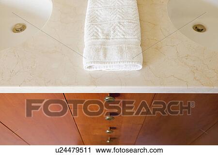 Hand towel on countertop in bathroom; Burbank; California; USA View Large Photo Image Stock Image - Hand towel on countertop in bathroom; Burbank; California; USA. Fotosearch