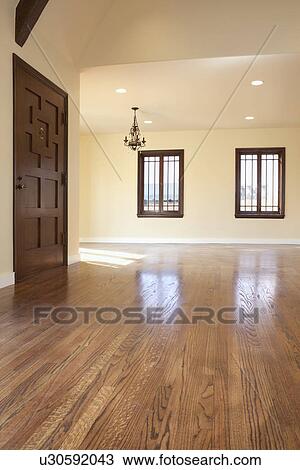 Stock Image - Hardwood floor in empty home, Pasadena, California, USA. Fotosearch