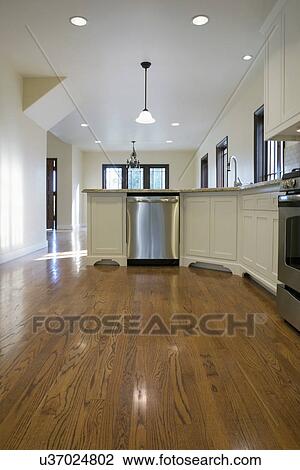 Stock Image - Hardwood floor in traditional kitchen, Pasadena, California, USA. Fotosearch